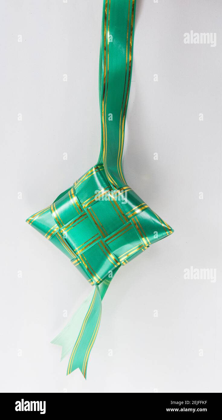 The beutiful green and gold line colors ribbon of ketupat raya Stock ...