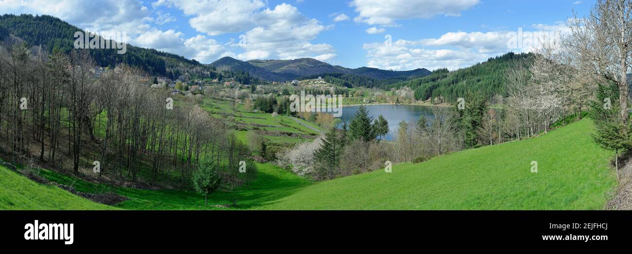 View of lake surrounded by mountains, Saint-Martial, Ardeche, Rhone-Alpes, Massif Central, France Stock Photo