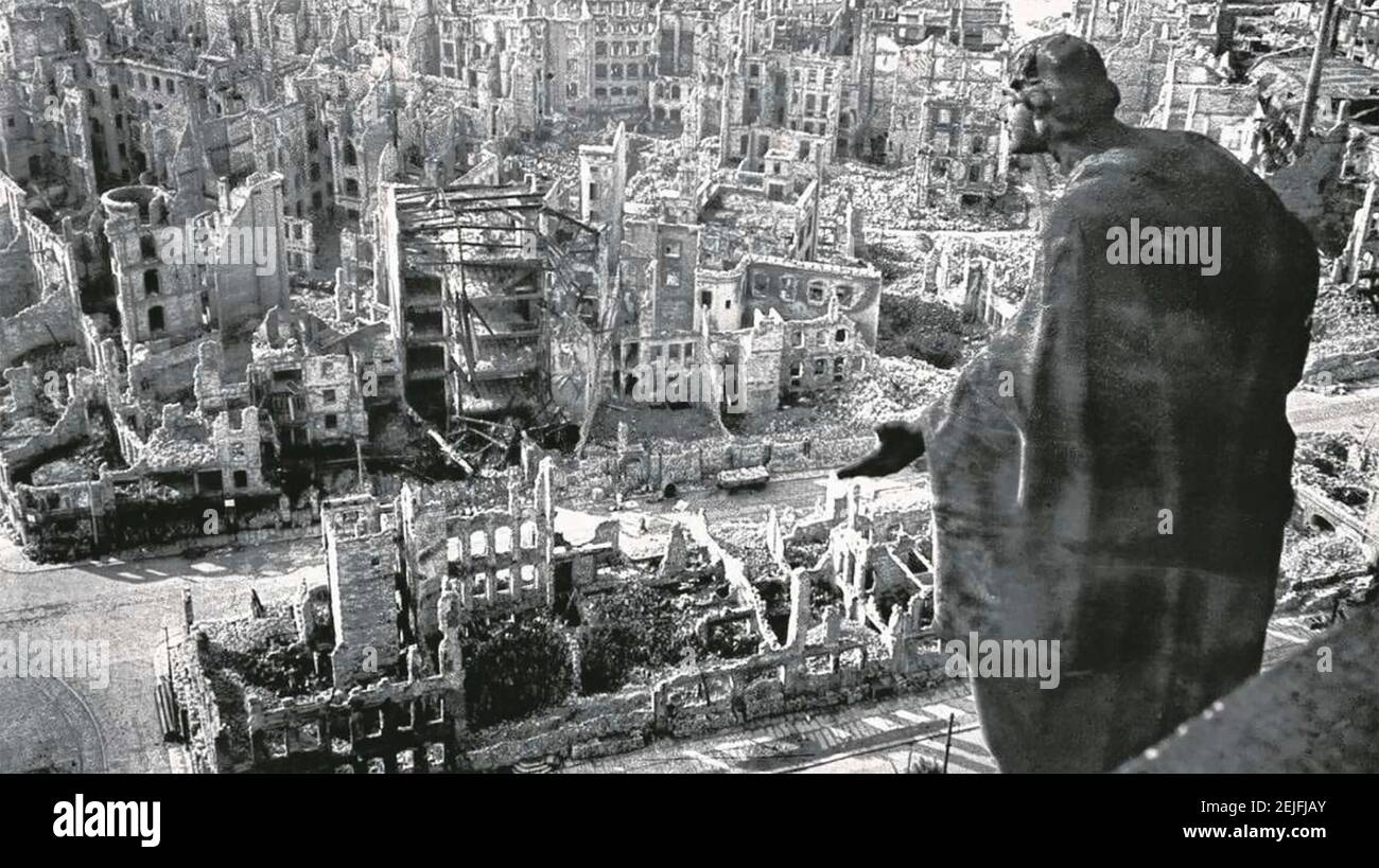 DRESDEN, Germany, in 1945 after the Allied bombing looking south from the Rathaus (town hall) past the 1910 statue depicting  Güte (kindness)  Photo: CC BY-SA.3.0 de Stock Photo