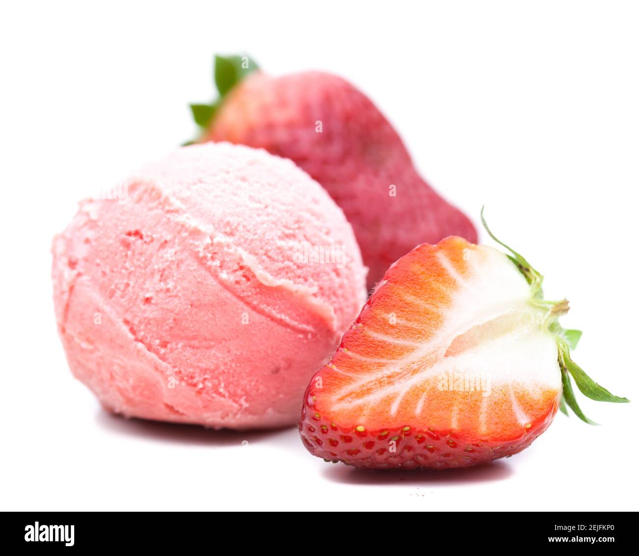 A scoop of strawberry ice cream with strawberries isolated on white ...
