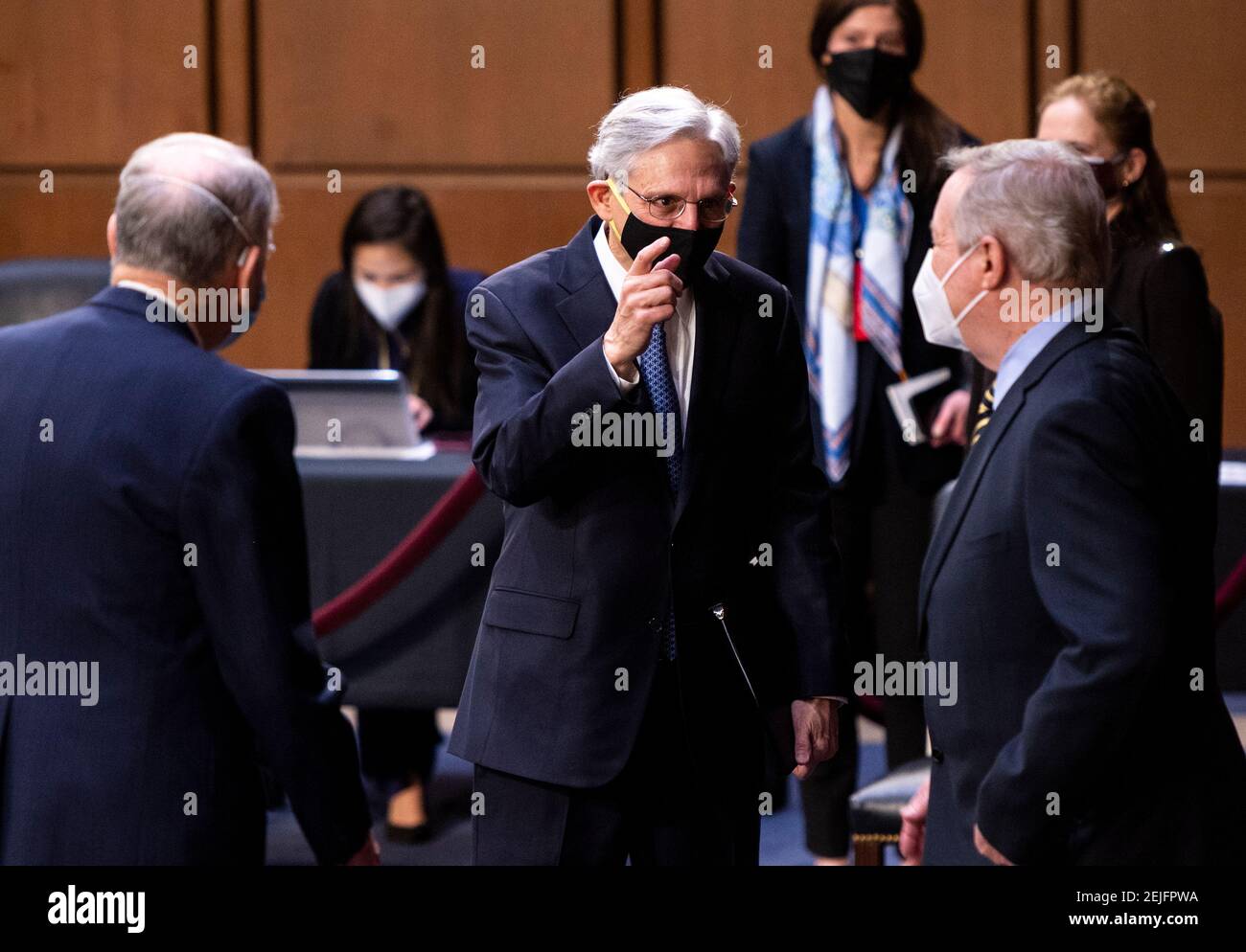 Washington, USA. 22nd Feb, 2021. UNITED STATES - FEBRUARY 22: Merrick Garland, center, nominee to be Attorney General, speaks with ranking member Sen. Chuck Grassley, R-Iowa, and chairman Sen. Richard Durbin, D-Ill., as he arrives for his confirmation hearing in the Senate Judicary Committee on Monday, Feb. 22, 2021. (Photo By Bill Clark/Pool/Sipa USA) Credit: Sipa USA/Alamy Live News Stock Photo