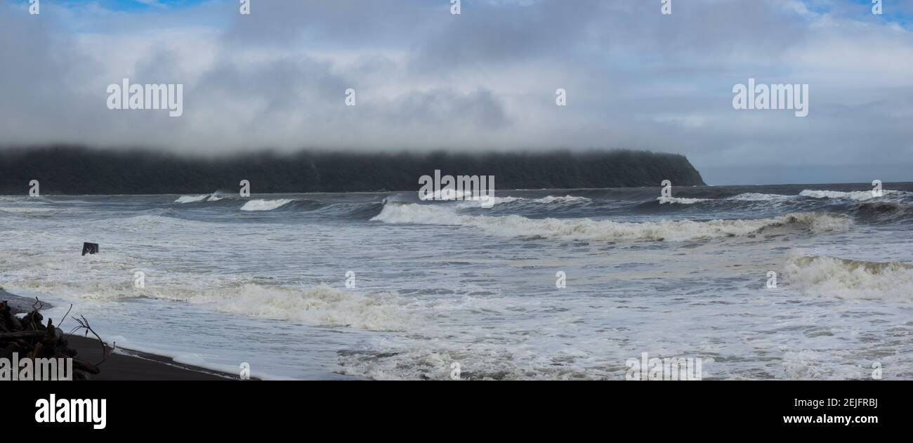 Waves splashing on the beach, Bruce Bay, Westland District, West Coast, South Island, New Zealand Stock Photo