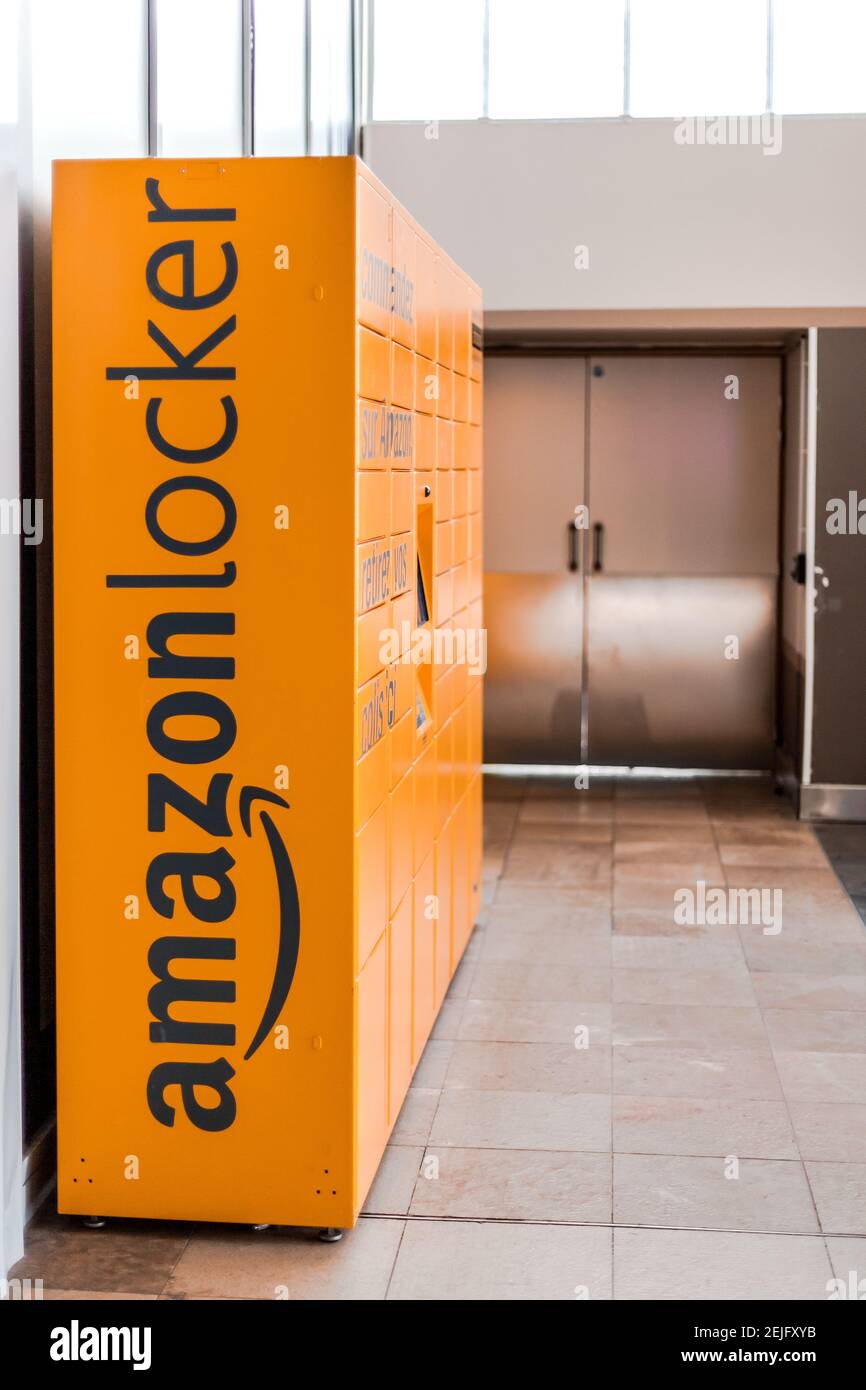 Amazon Locker in shopping mall, orange pick up point for mail order goods  with Amazon brand logo on it. Lyon, France - February 23, 2020 Stock Photo  - Alamy
