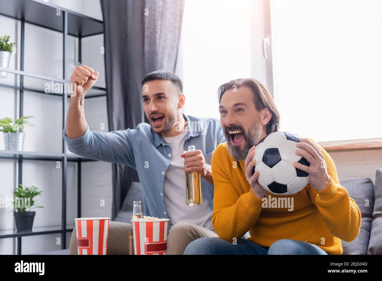Father Son Watch Football Match High Resolution Stock Photography And Images Alamy