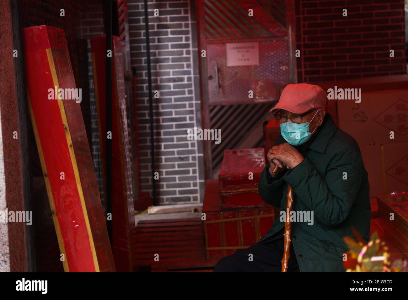 An elderly man with a surgical mask following the outbreak of the Wuhan ...