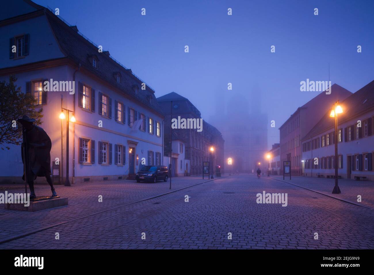 Buildings along Maximilianstrasse at dawn fog, Speyer, Rhineland-Palatinate, Germany Stock Photo