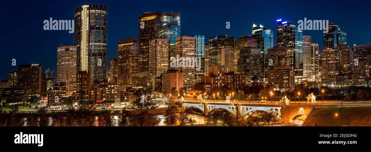 Illuminated bridge and skylines in a city, Center Street Bridge, Bow River, Calgary, Alberta, Canada Stock Photo