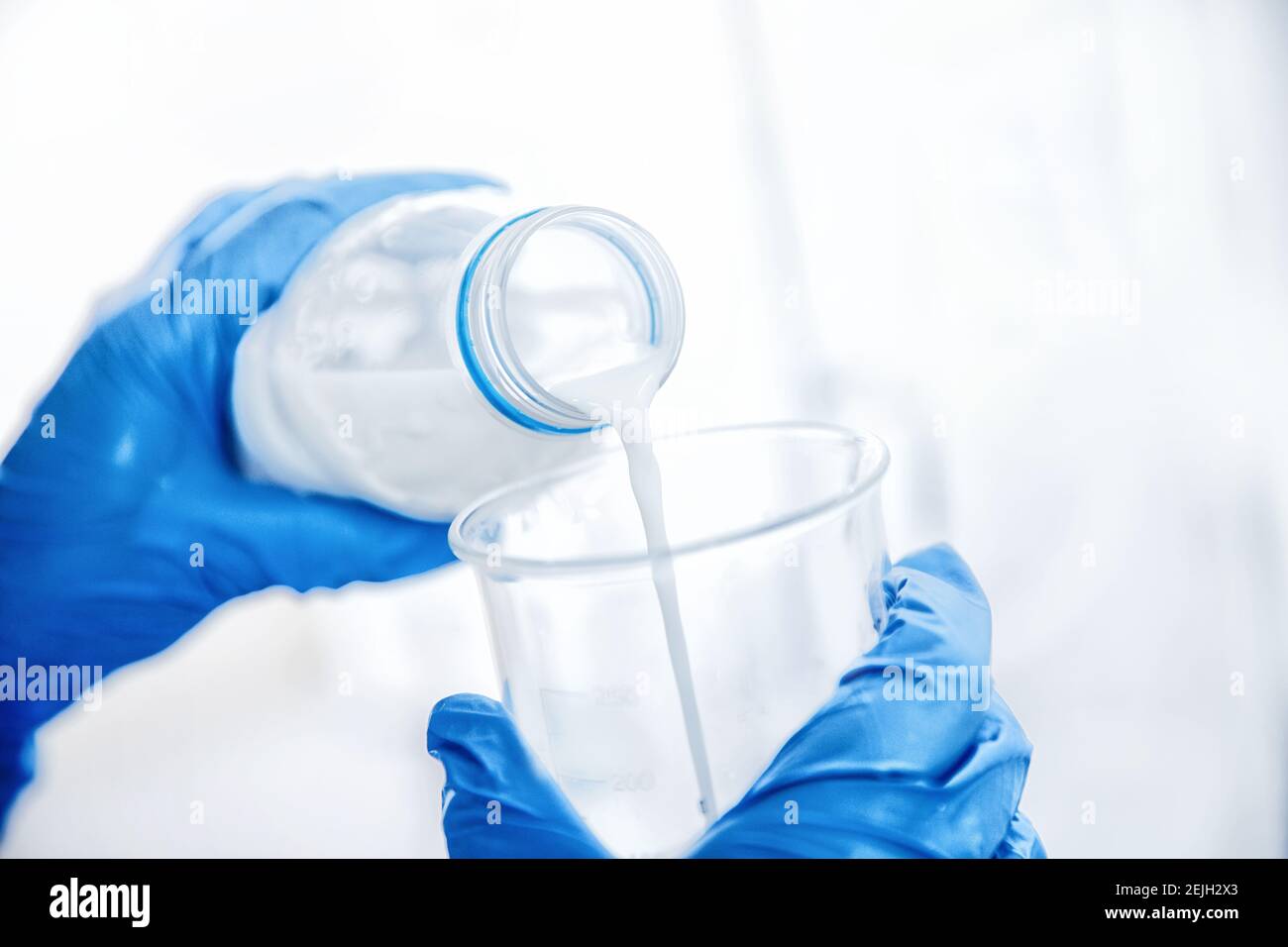 Dairy factory industry products. Quality control test of milk in