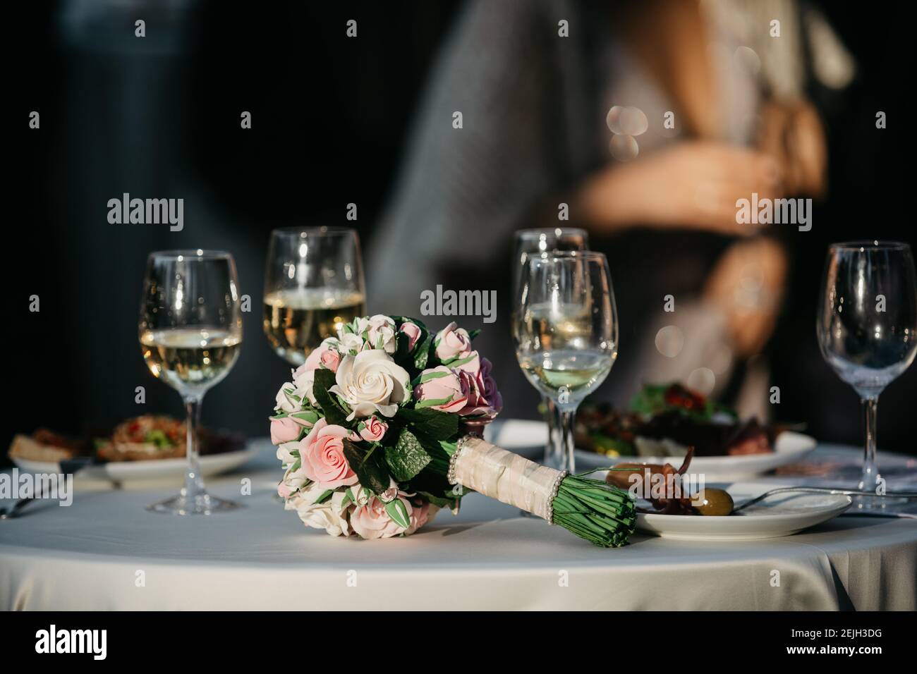 Dinner after marriage ceremony, bridal bouquet and good party Stock
