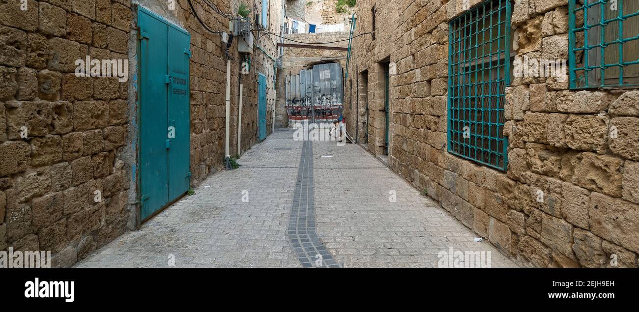 View of narrow alley, Acre (Akko), Israel Stock Photo