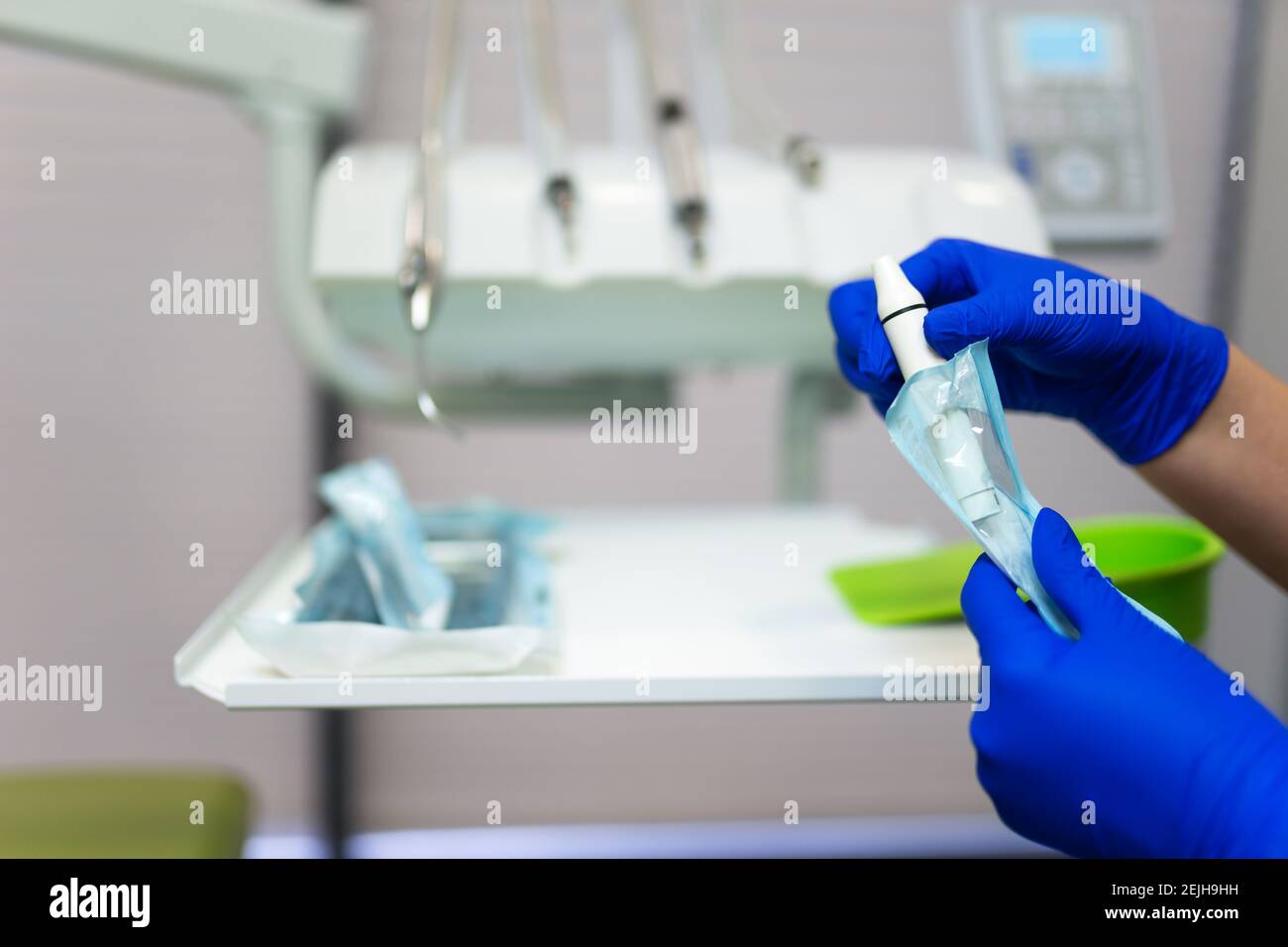 Dentist doctor opening sealed sterile dental instruments Stock Photo Alamy