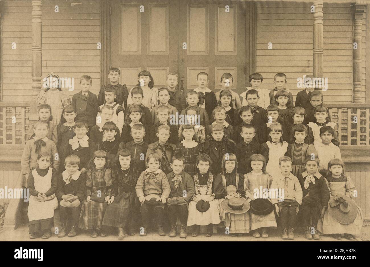 Antique c1880 photograph, group of primary school children spanning several grade, possibly 1st through 6th grades. Probably New England, exact location unknown. SOURCE: ORIGINAL PHOTOGRAPH Stock Photo