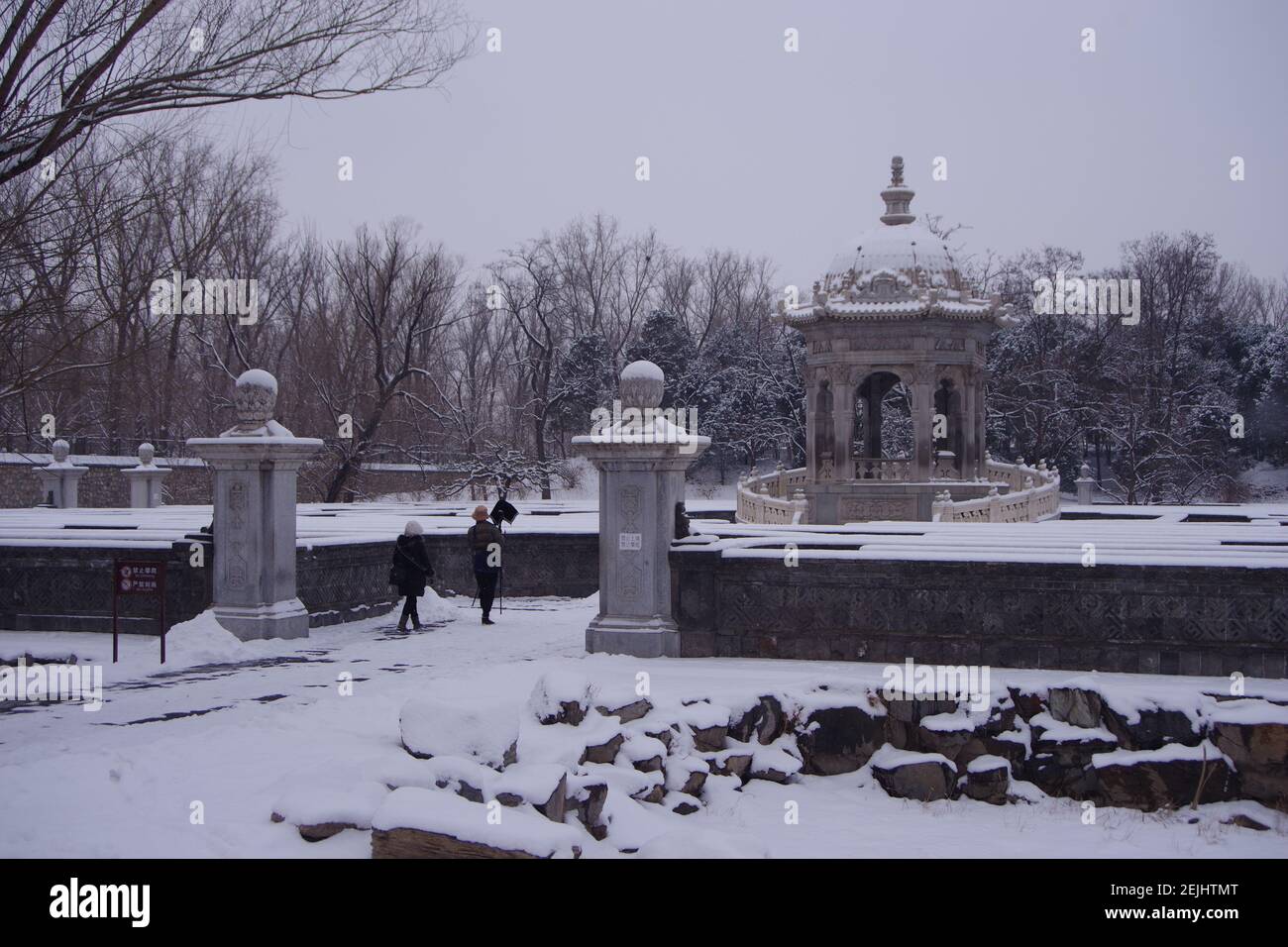 The snow covers debris of the Old Summer Palace, known in Chinese as