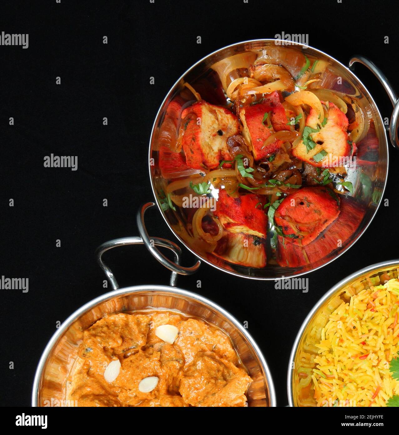 Indian curry dishes served Stock Photo - Alamy