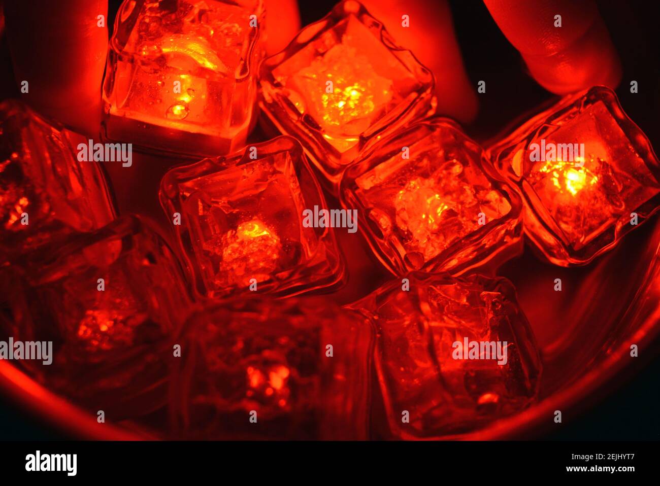 The original and not ordinary background of light plastic ice cubes ...