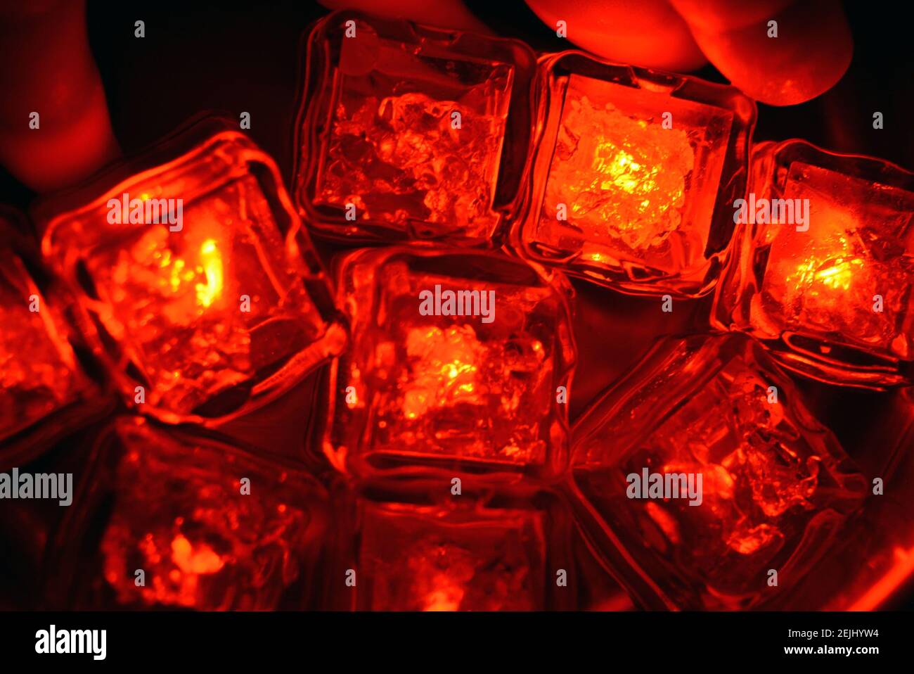 The original and not ordinary background of light plastic ice cubes ...