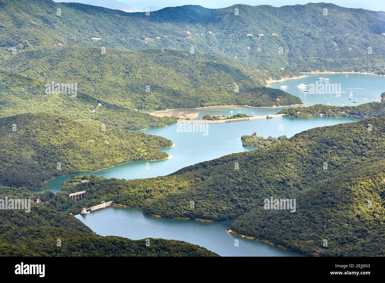 View over Tai Tam Intermediate reservoir (foreground) and Tai Tam Tuk Resrvoir (middle) from the Wilson Trail Stock Photo