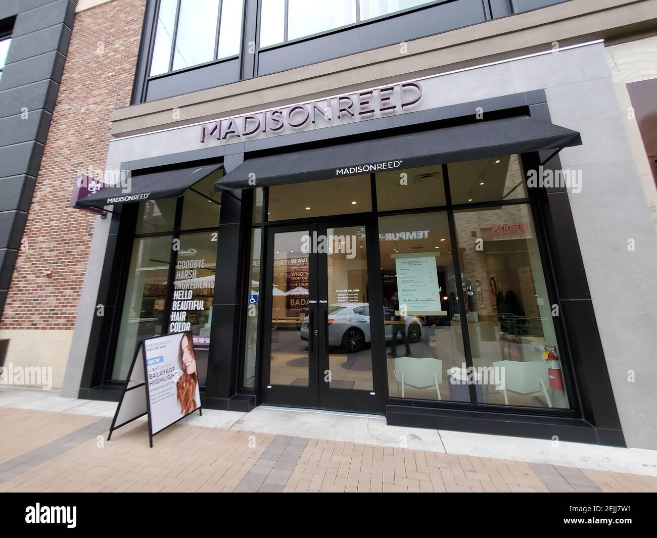 Wide angle of facade at Madison Reed hair color store in Broadway Plaza