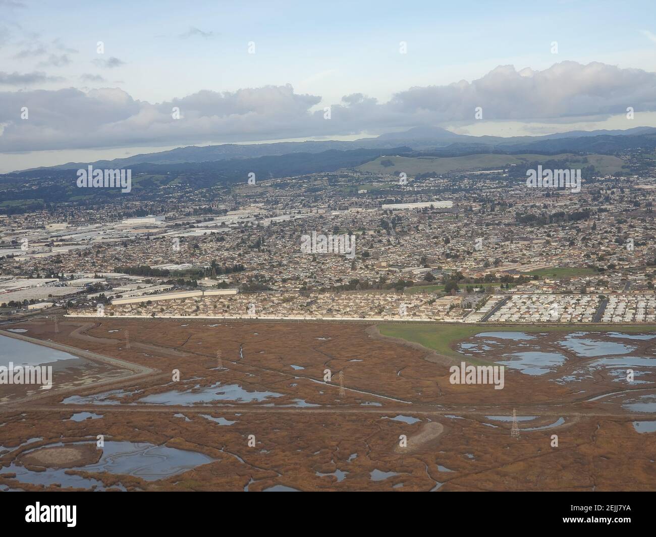 Heron Bay and neighborhoods are visible in an aerial view of the East