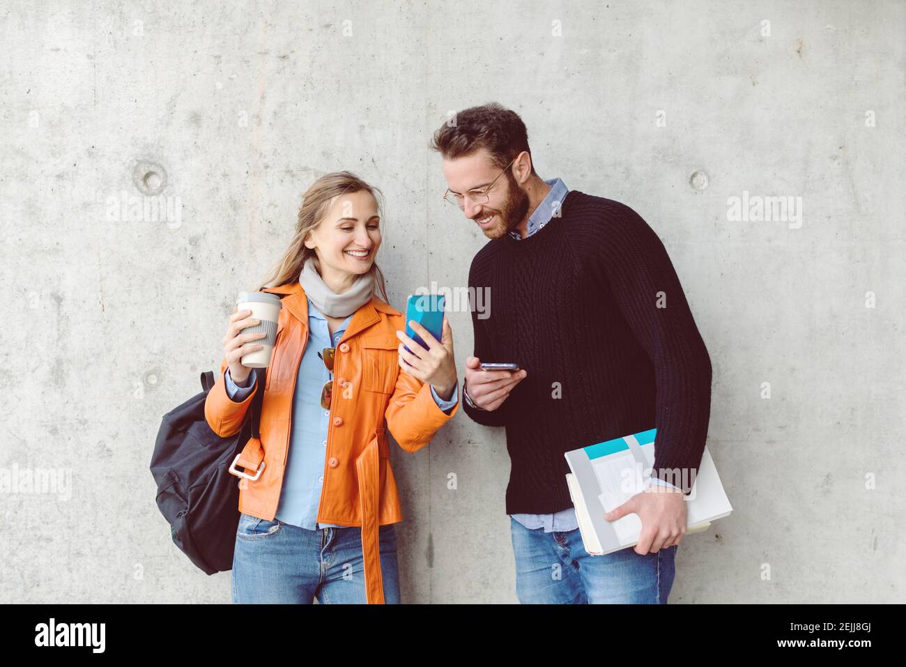 Students on campus taking a selfie with a phone Stock Photo