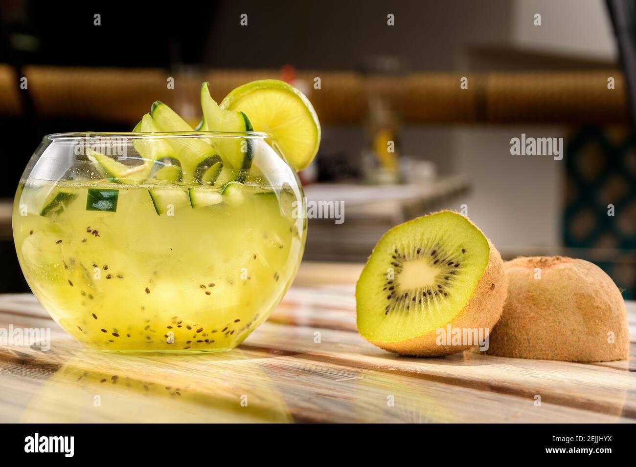 View of a refreshing kiwi flavored drink served in a fishbowl Stock Photo