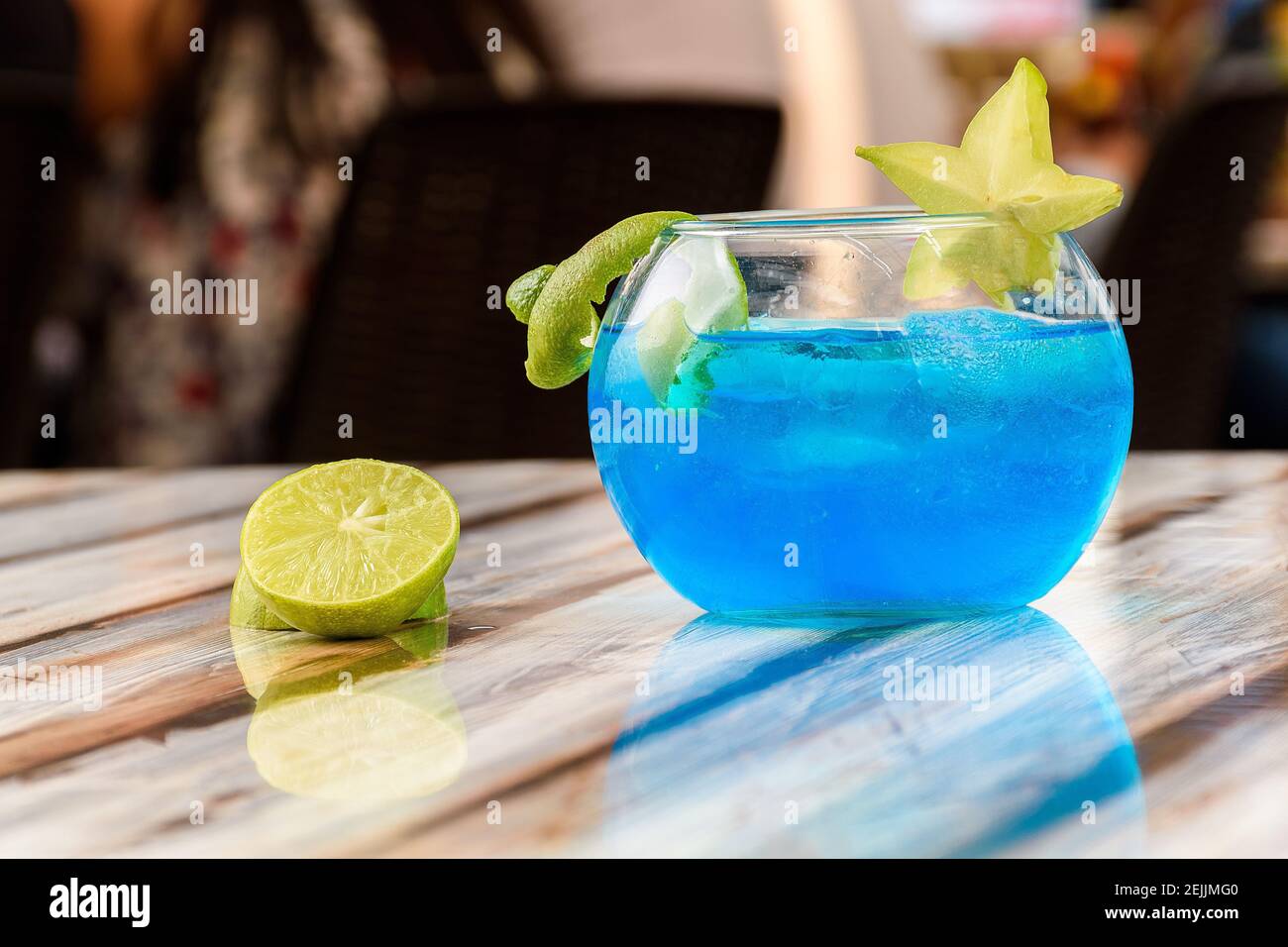 Close-up of a blue lemonade drink served in a large fishbowl Stock Photo