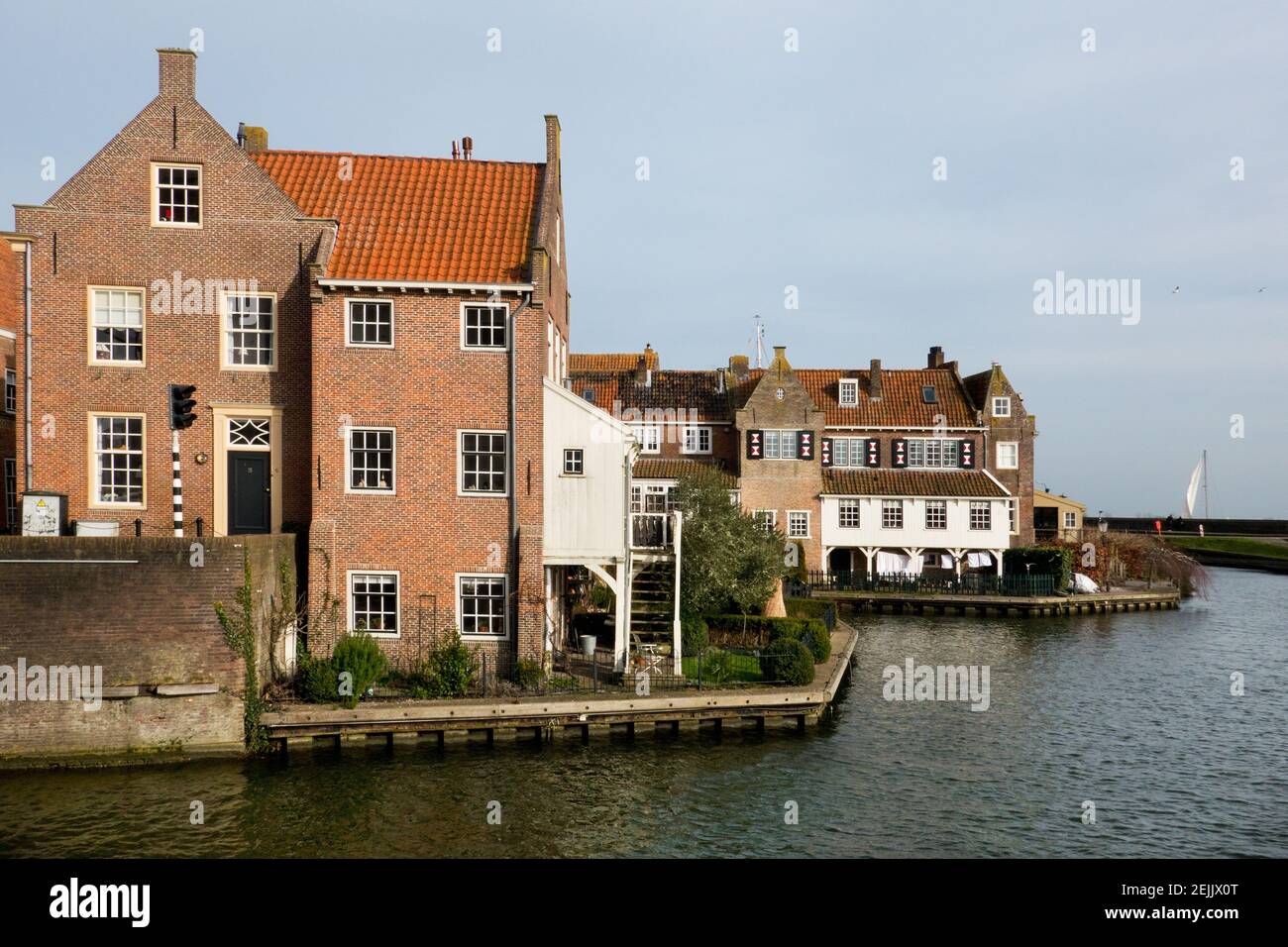 Enkhuizen, historic harbor town, traditional old brick buildings with tile roofs Stock Photo