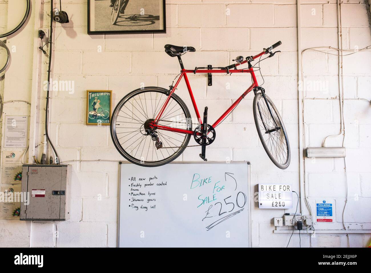 A cool bike hanging for storage. Stock Photo