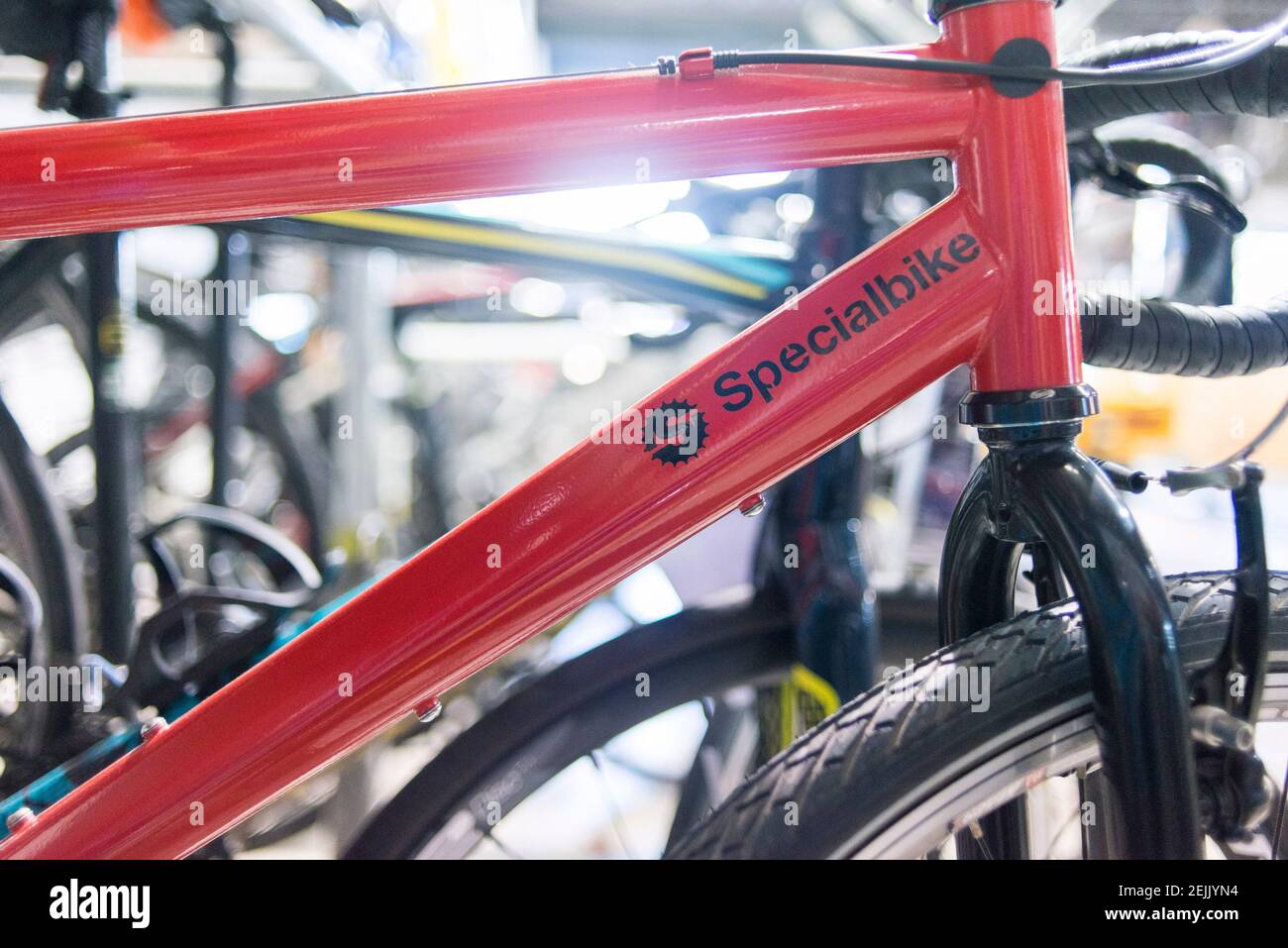 Bike frames lined up and stored in a warehouse Stock Photo Alamy