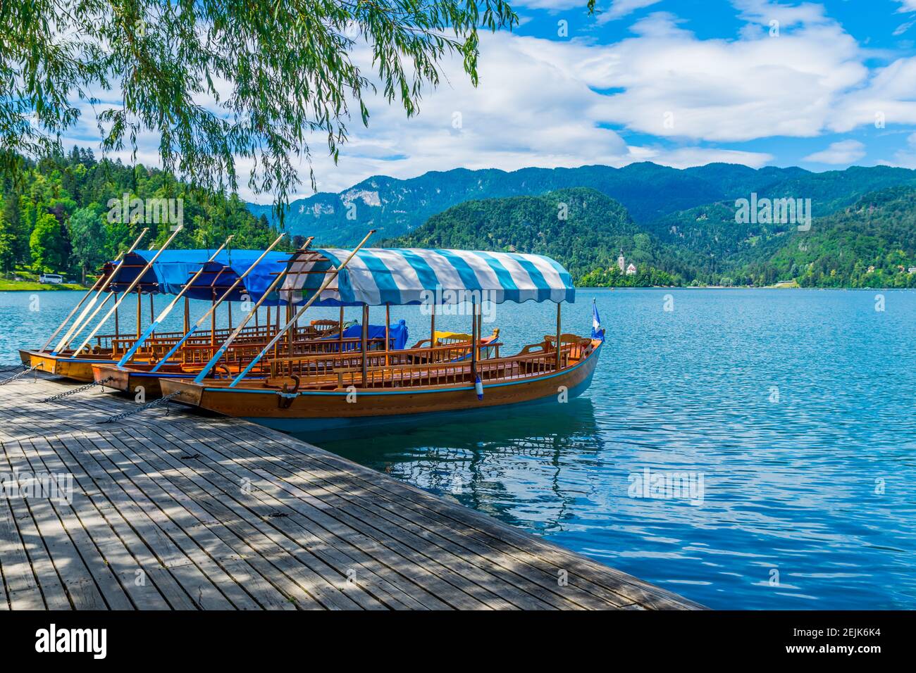 Slovenia Traditional Pletna boat is waiting for you at Bled Lake Stock Photo