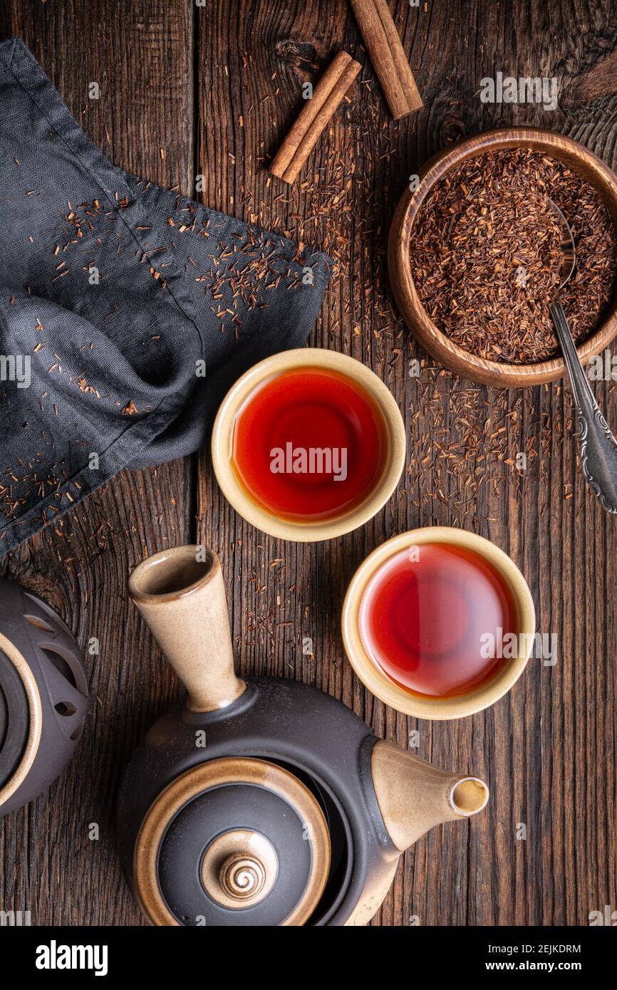 Freshly made Rooibos tea full of antioxidants on wooden background Stock Photo