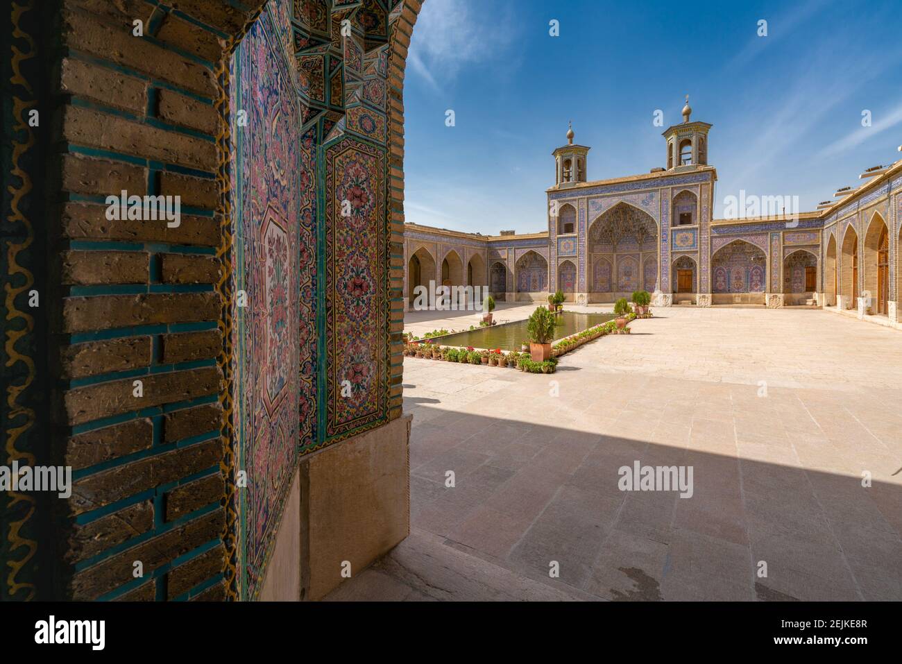 Shiraz, Iran-04.17.2019: Courtyard of the Pink Mosque, Nasir al-Mulk, with no people. Beautiful mosque built by Qajar dynasty. Stock Photo