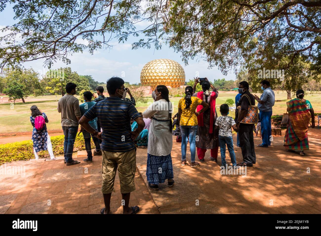 Visitors at Matrimandir in Auroville established by Mira Alfassa 'The Mother' in Pondicherry or Pudhucherry, Tamil Nadu, India Stock Photo