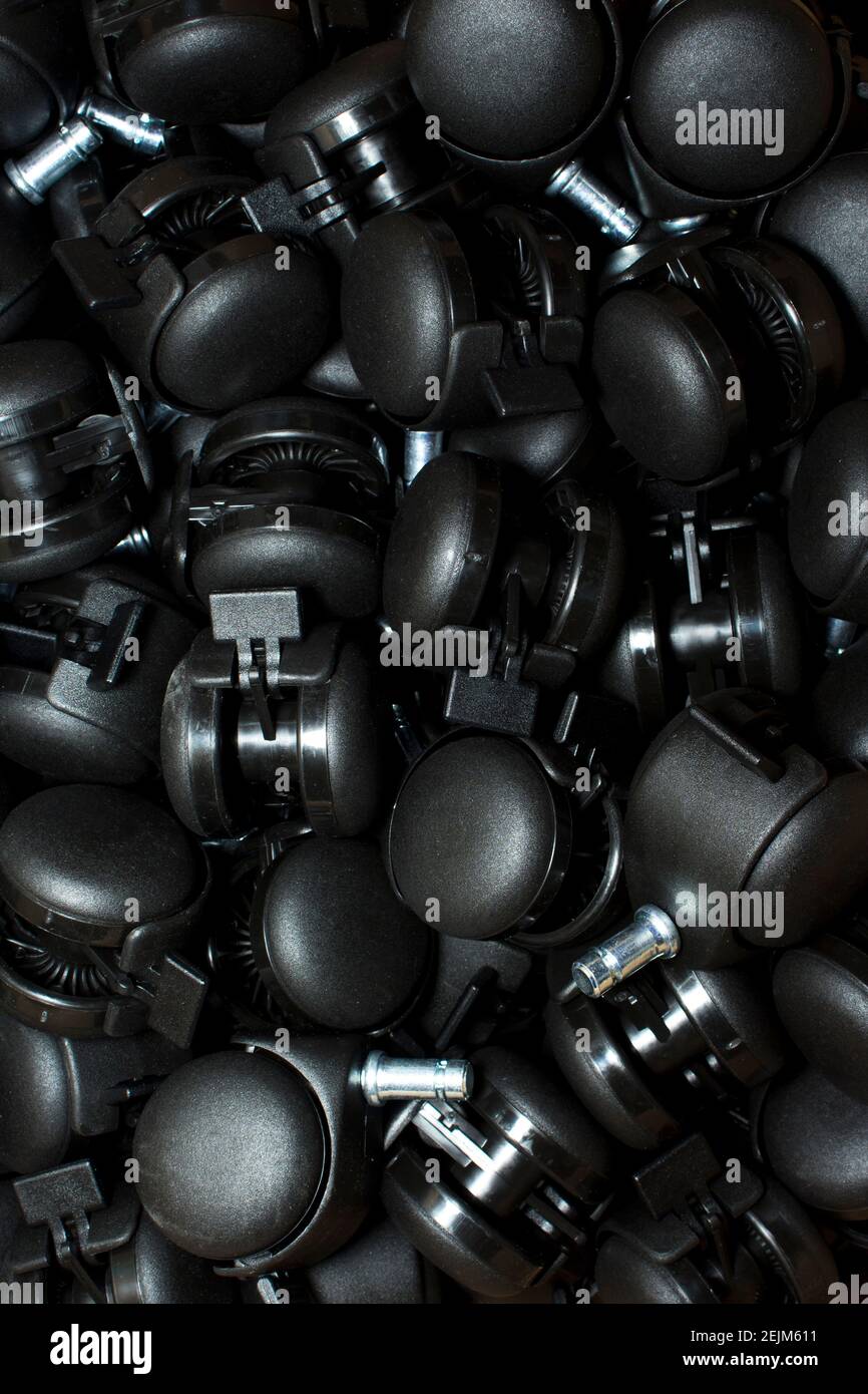 Black plastic wheel roller unit component Stock Photo