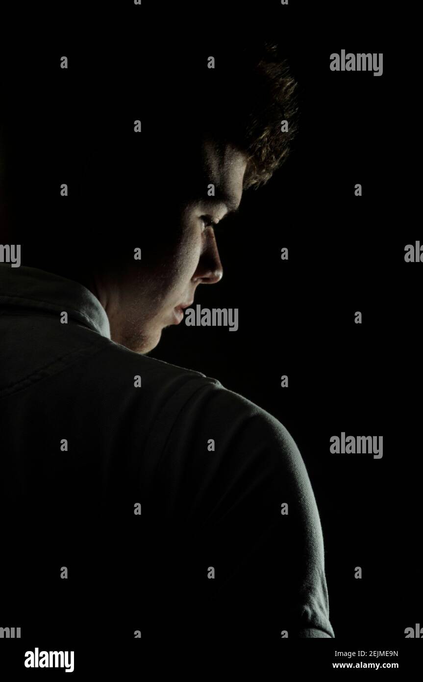 Moody teen boy hi-res stock photography and images - Alamy