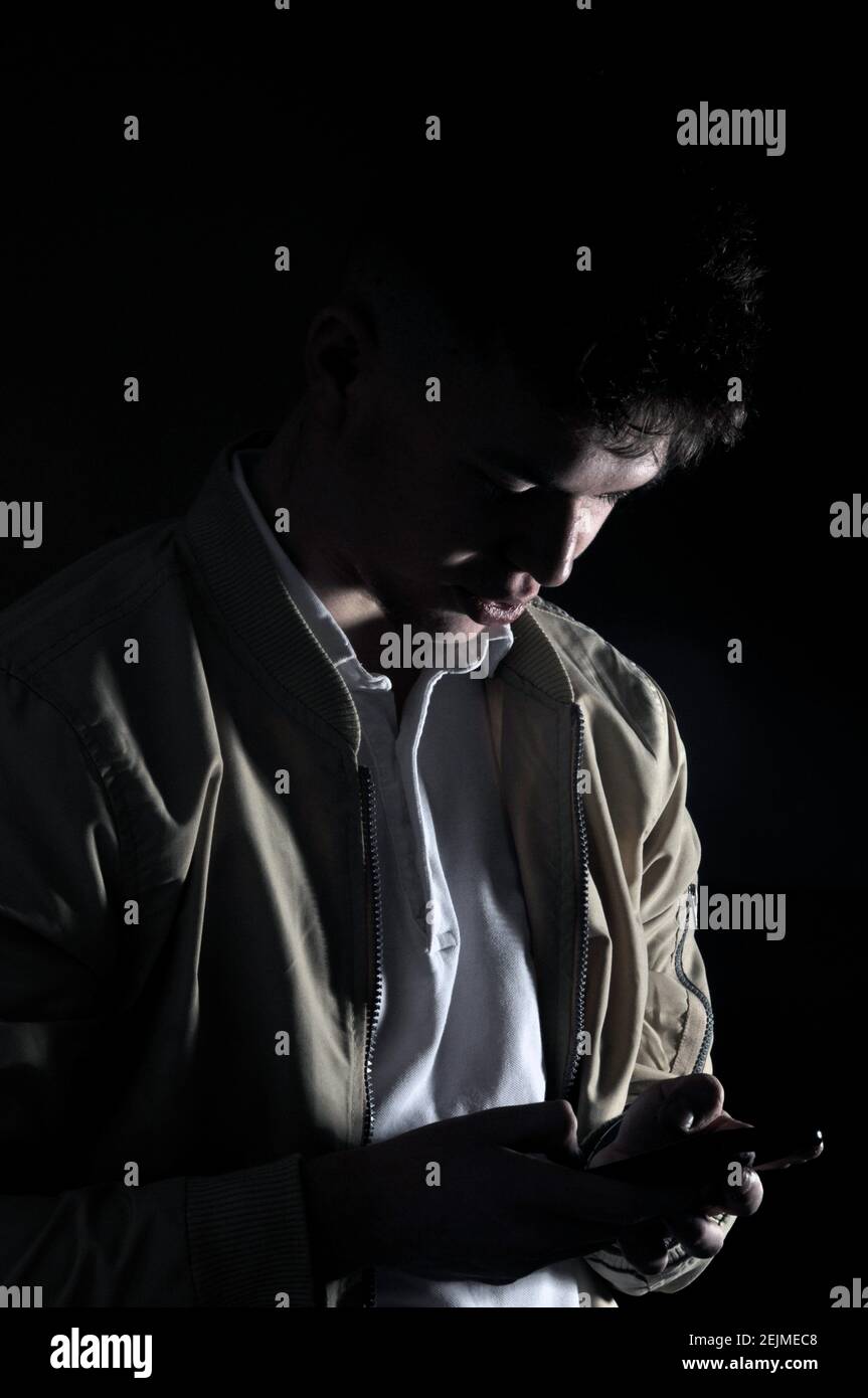 Moody teen boy hi-res stock photography and images - Alamy