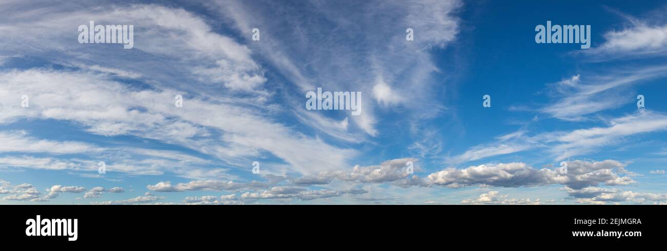 Blue sky with white clouds in a beautiful summer day Stock Photo - Alamy