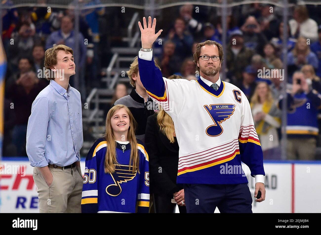 Feb 8, 2020; St. Louis, Missouri, USA; Former St. Louis Blues defenseman  Chris Pronger (44) waves to fans after it was announced that the Blues  would retire his jersey next year prior