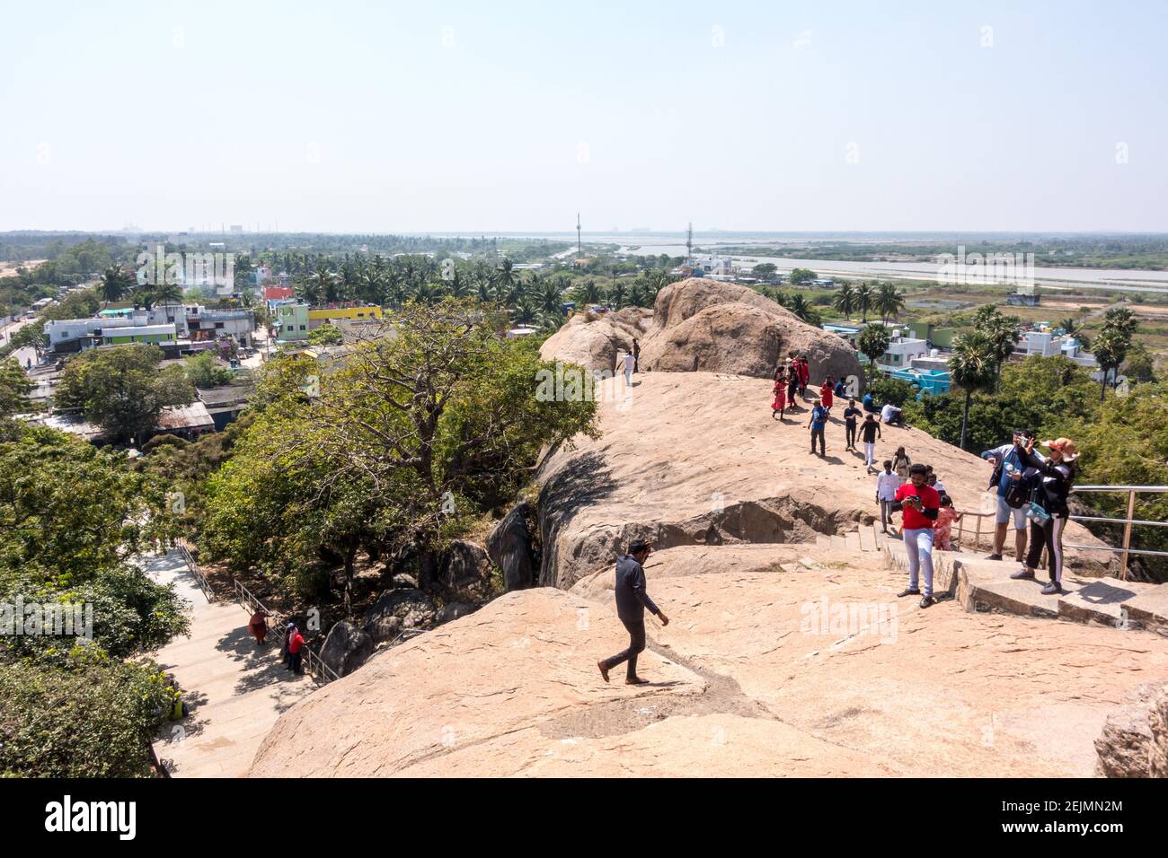 Tourists at Mahabalipuram rocks Stock Photo