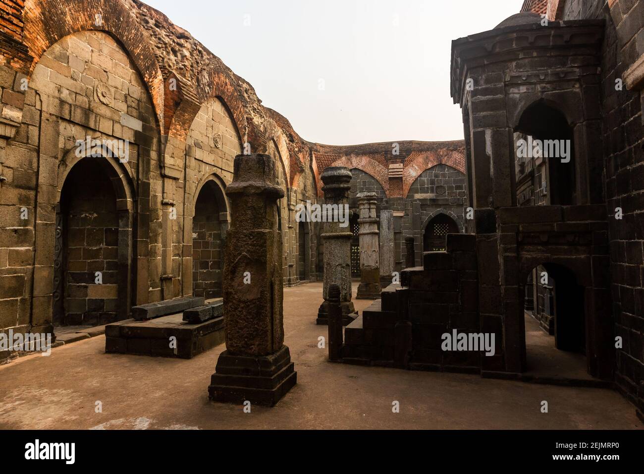 A stone pulpit in a hall at the ruins of an ancient Qutb Shahi mosque in the village of Pandua near Malda in West Bengal, India. Stock Photo