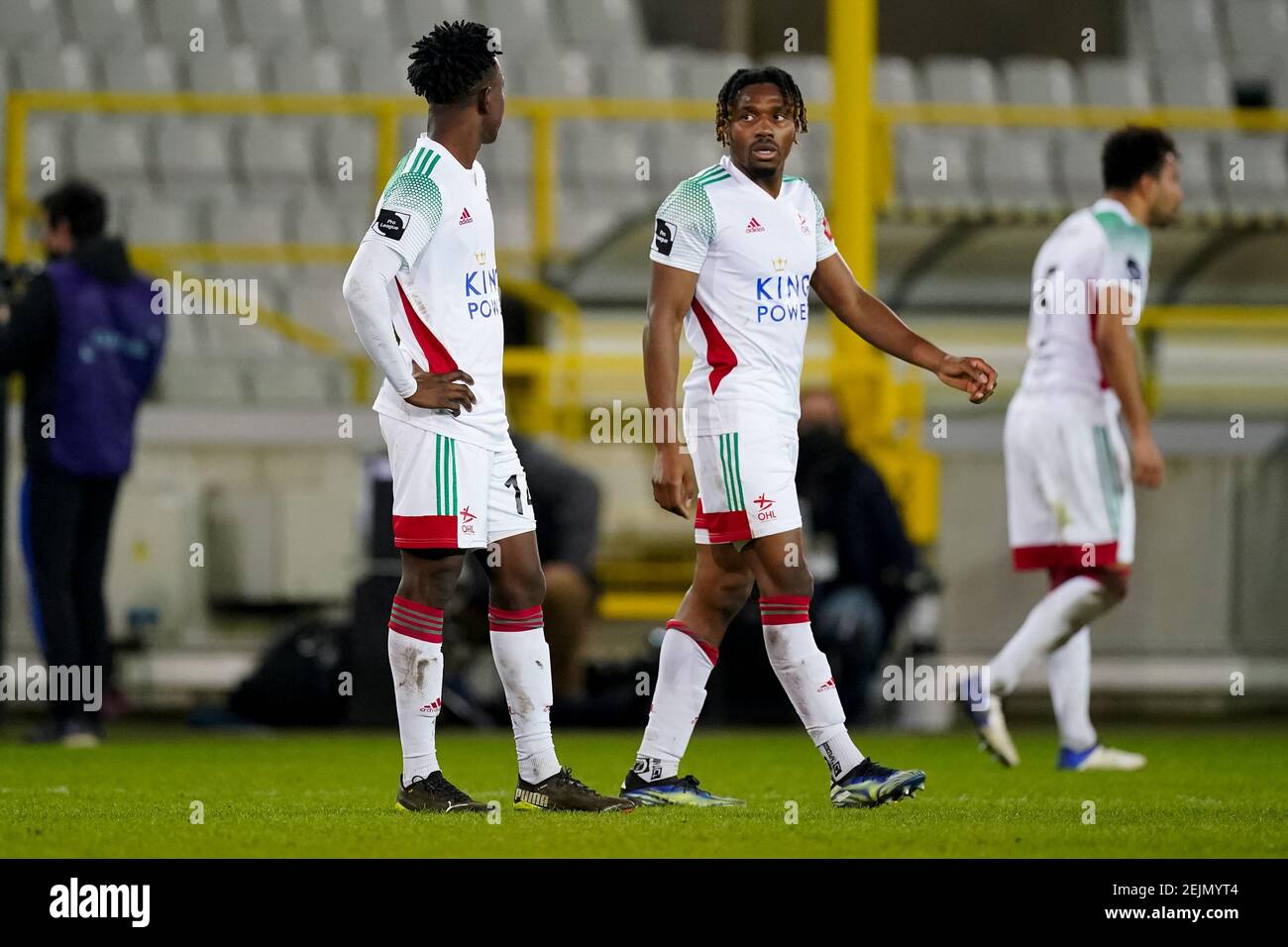 BRUGES, BELGIUM - FEBRUARY 22: Kamal Sowah of OH Leuven and Joshua Eppiah of OH Leuven look dejected during the Jupiler Pro League match between Club Stock Photo