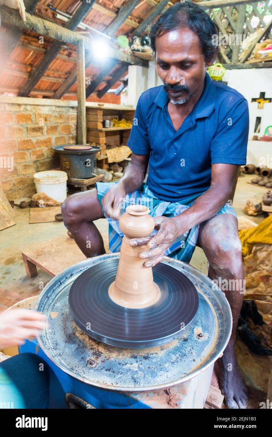 Man making pottery in full work setup Stock Photo Alamy