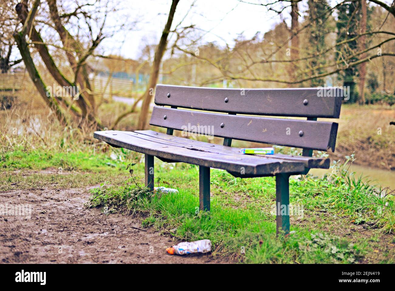 Littered bench Stock Photo