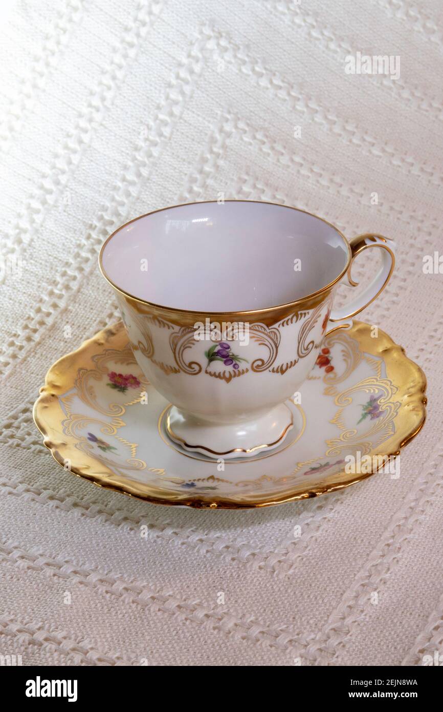 Empty Transparent Glass Tea Cup With Handle On Glass Saucer Closeup On A  White Background Stock Photo, Picture and Royalty Free Image. Image  92433293.