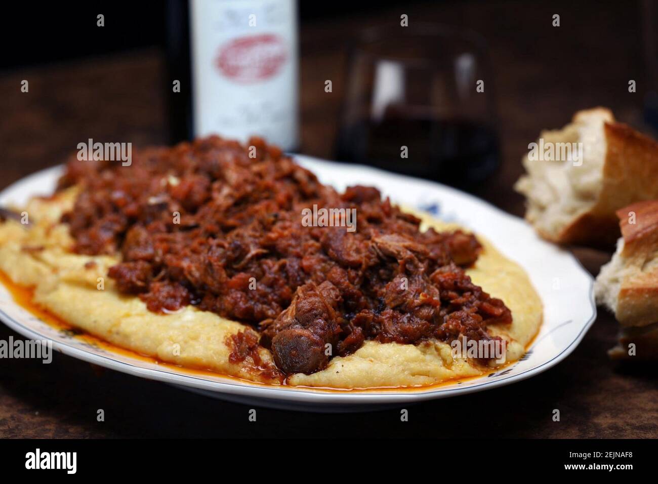 Baked Polenta Is Topped With A Pork Ragu Spare Ribs Braised With Aromatic Vegetables Red Wine And Tomatoes The Dish Calls For Baking And Slicing The Finished Polenta For Serving But You