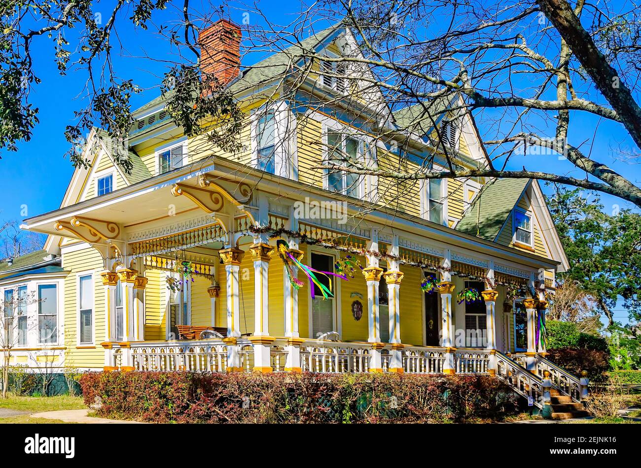 A house is decorated for Mardi Gras on Government Street, Feb. 19, 2021, in Mobile, Alabama. Stock Photo