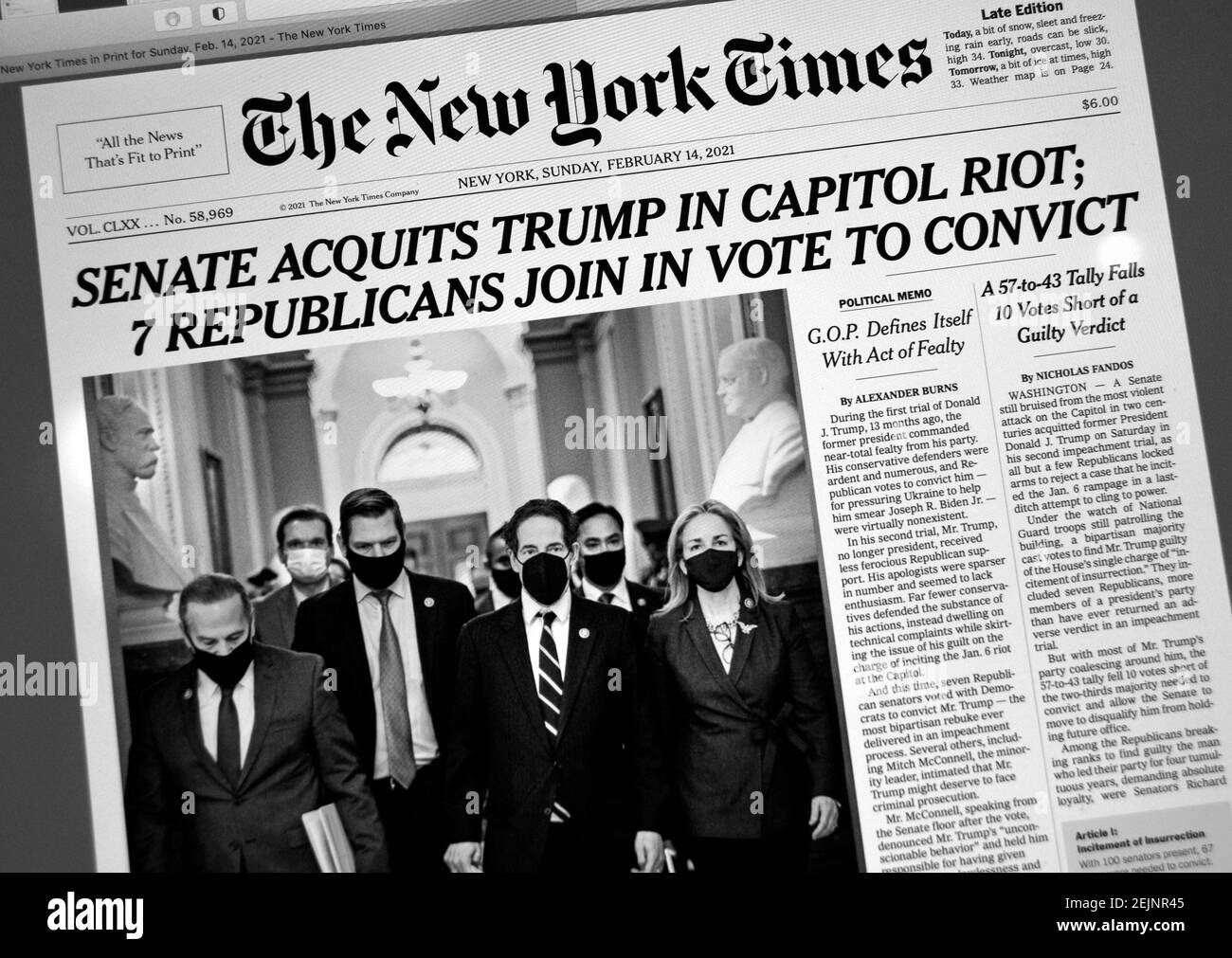 A computer screen shot of The New York Times website and front page the day following the Senate acquittal of former U.S. President Donald Trump. Stock Photo