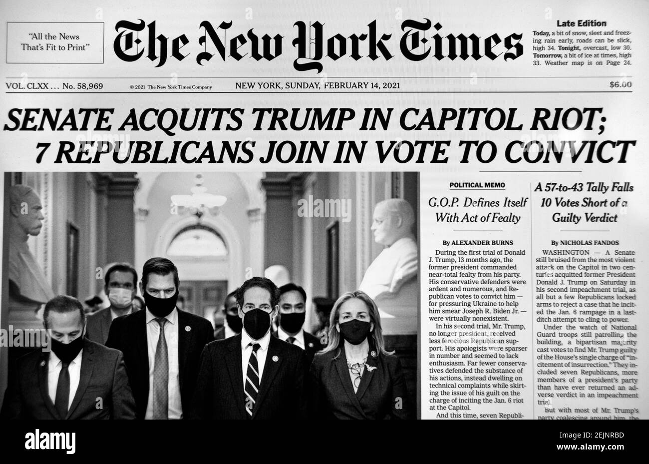 A computer screen shot of The New York Times website and front page the day following the Senate acquittal of former U.S. President Donald Trump. Stock Photo