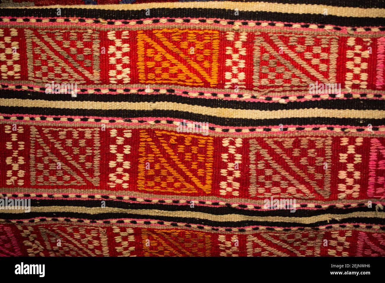Traditional Turkish rug textile with patterns in bazaar Stock Photo Alamy