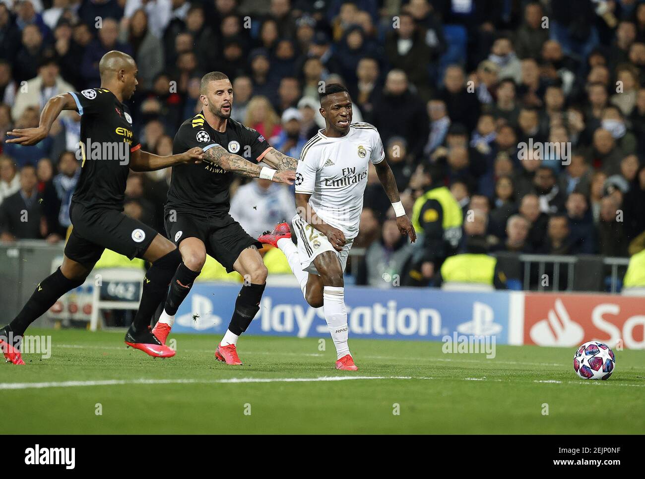 Kyle Walker of Manchester City pushing Real Madrid CF's Vinicius Jr